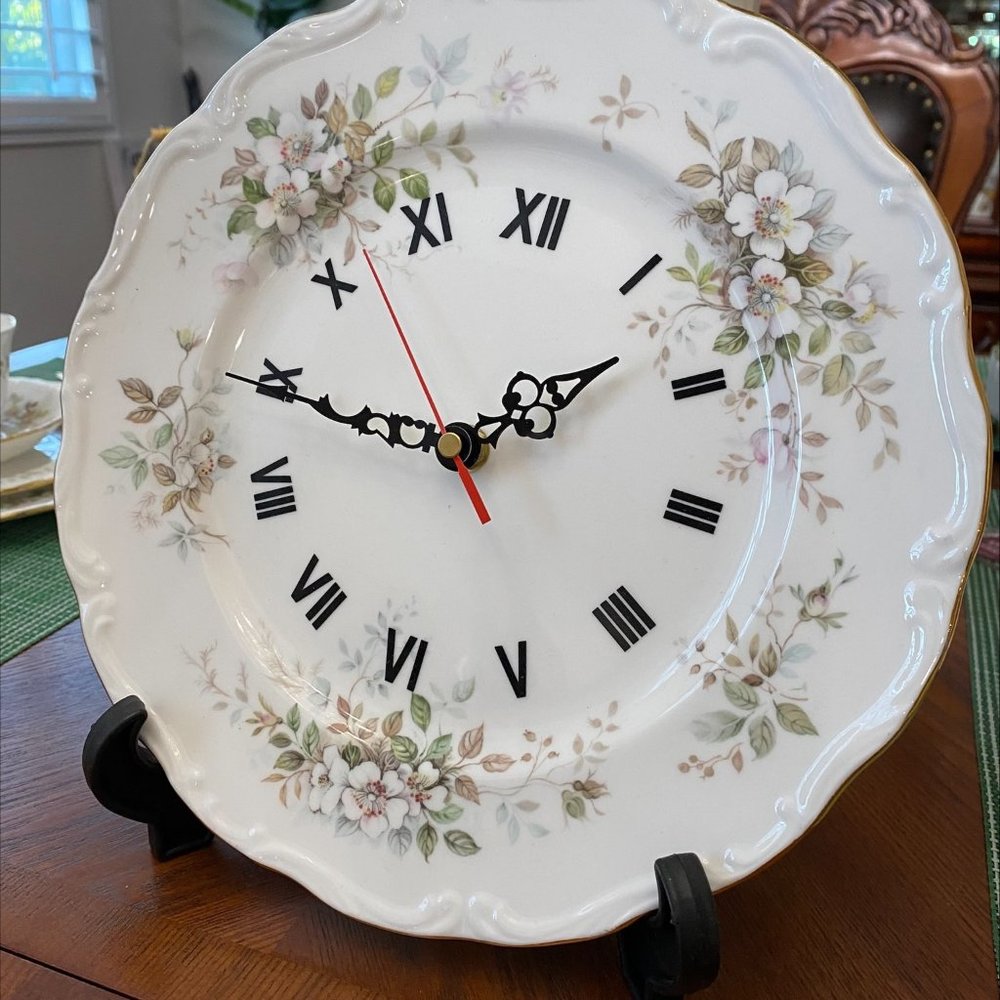 ROYAL ALBERT HAWORTH WALL CLOCK. NEW, NEVER USED.